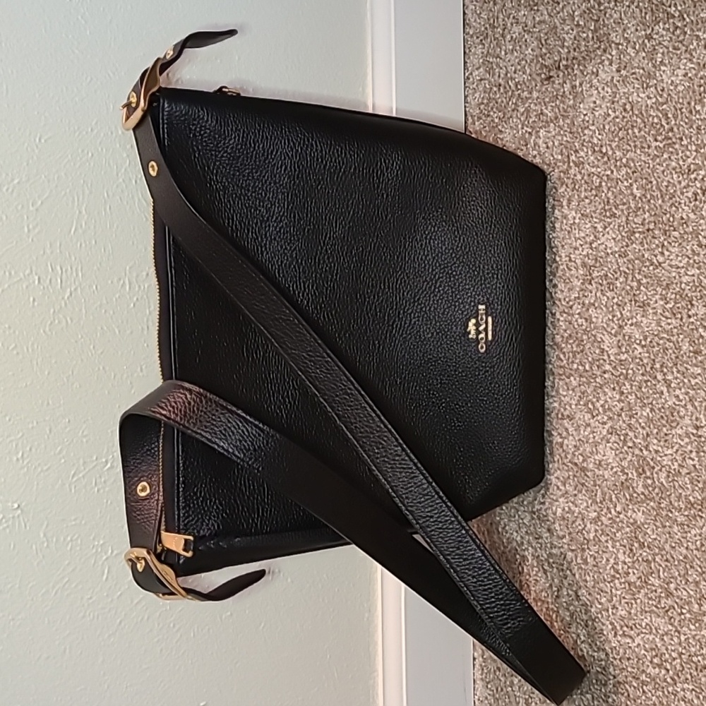 COACH pebbled leather duffle handbag